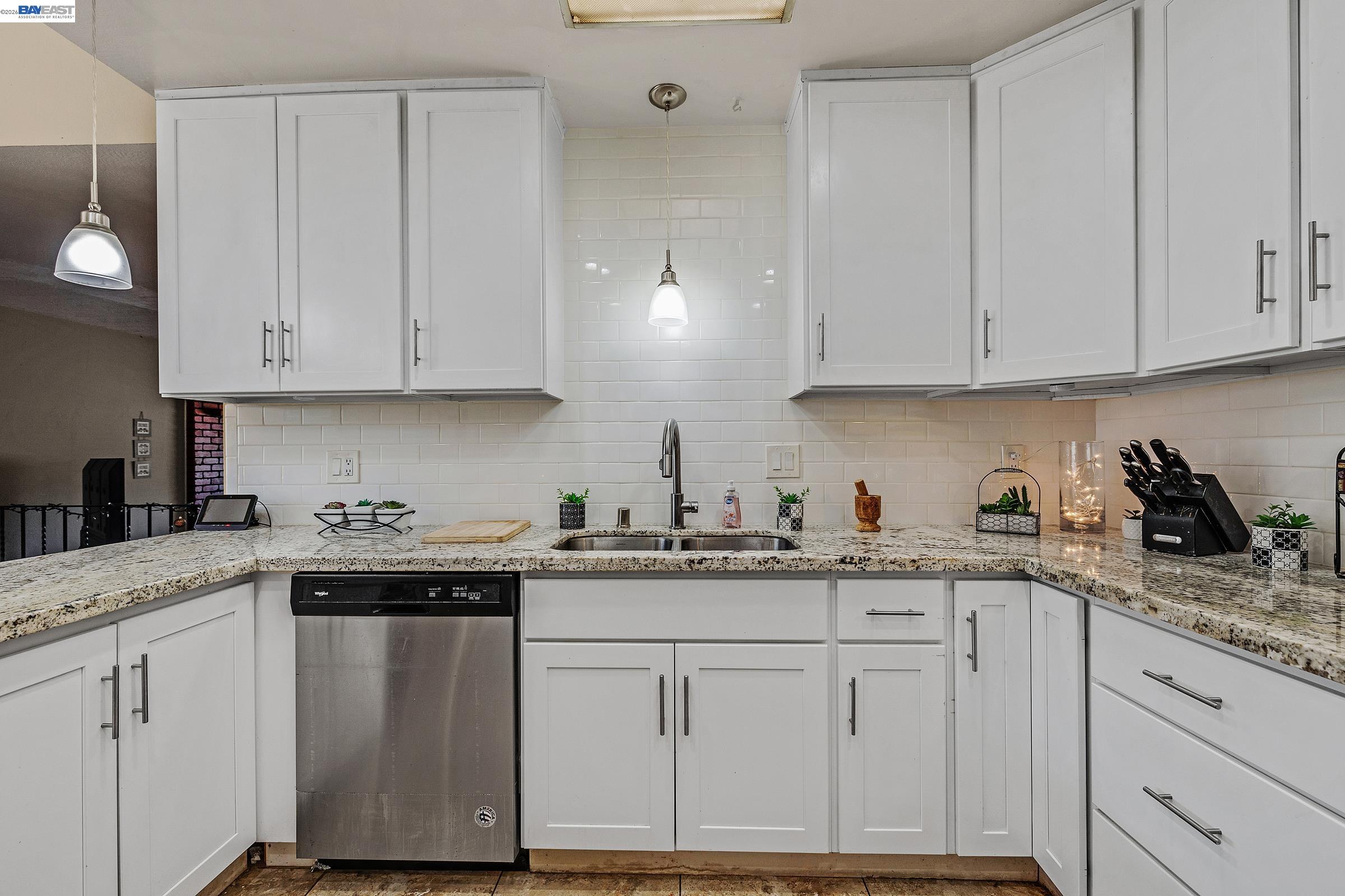 30236 Vanderbilt Street Hayward, CA 94544 - Photo 9 of 46 a kitchen with granite countertop white cabinets and white appliances