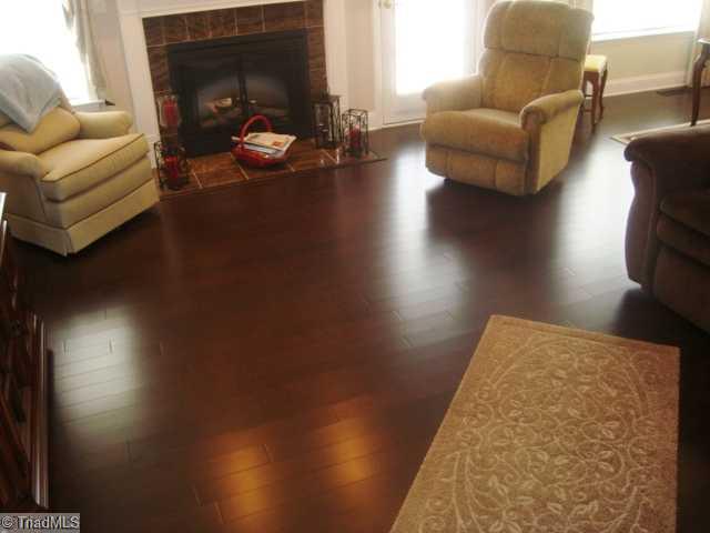 620 Hunters Knoll Road Winston-Salem, NC 27106 - Photo 14 of 16 Living Room. Up close on the hardwood floors and the electric fireplace. All the neat you could want from a glowing fireplace.