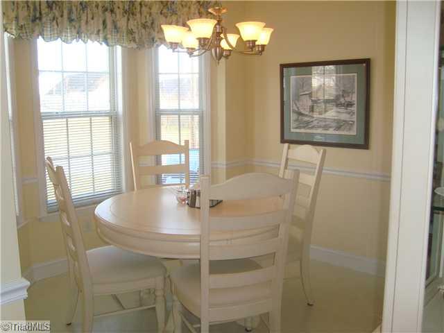 620 Hunters Knoll Road Winston-Salem, NC 27106 - Photo 3 of 16 Breakfast. How good would that first cup of morning coffee taste in this lovely, bright breakfast room?