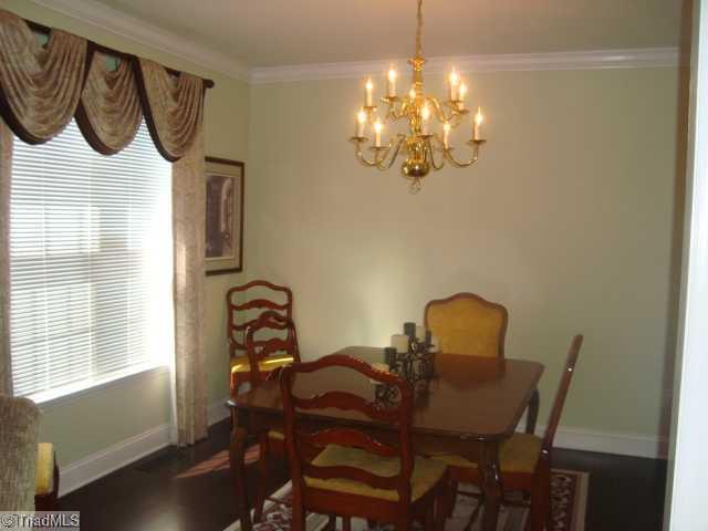 620 Hunters Knoll Road Winston-Salem, NC 27106 - Photo 4 of 16 Dining Room. Spacious dining room open and airy with luxurious hardwood floors.
