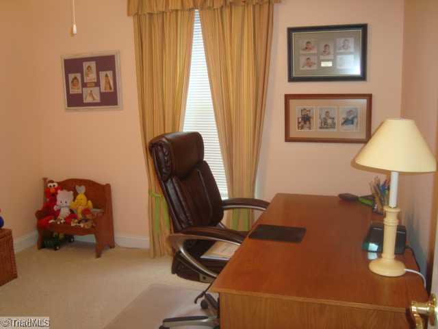 620 Hunters Knoll Road Winston-Salem, NC 27106 - Photo 10 of 16 3rd Bedroom. Third bedroom doubling as a space for your office. A day bed or twin would fit nicely in here along with the desk.