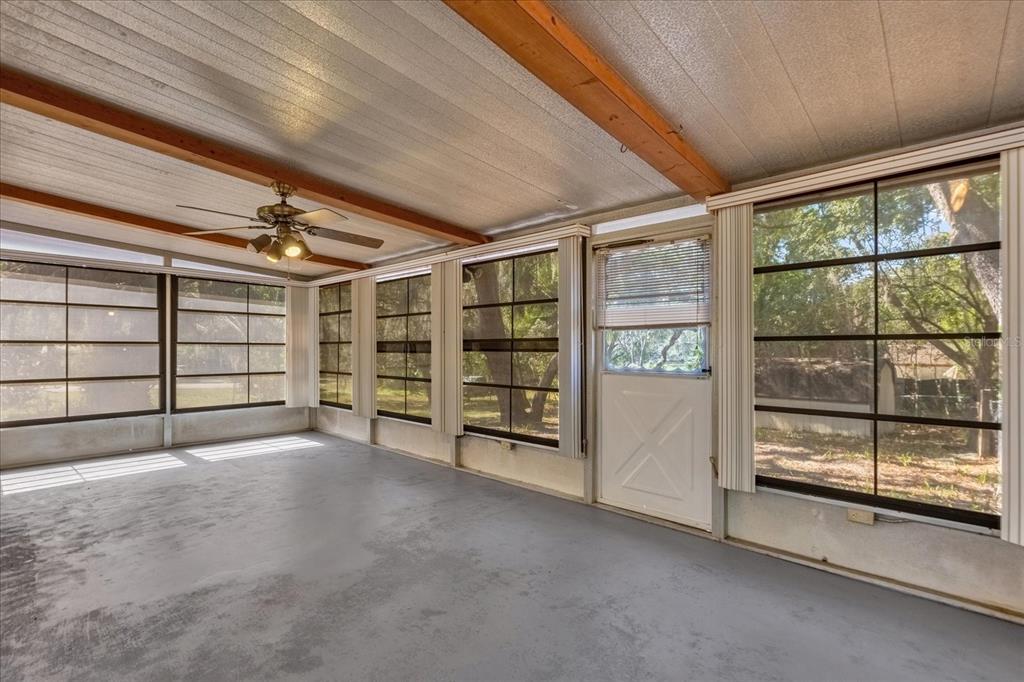 1610 Glenwood Road DeLand, FL 32720 - Photo 23 of 35 a view of an empty room with a balcony