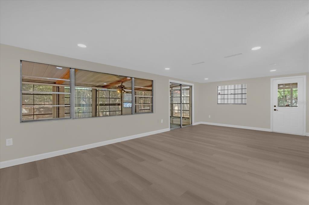 1610 Glenwood Road DeLand, FL 32720 - Photo 4 of 35 an empty room with windows