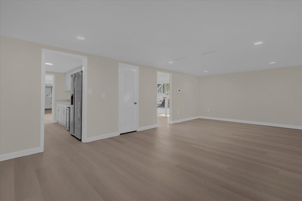 1610 Glenwood Road DeLand, FL 32720 - Photo 5 of 35 a view of a livingroom with wooden floor