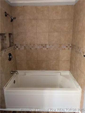 a bathroom with a bathtub