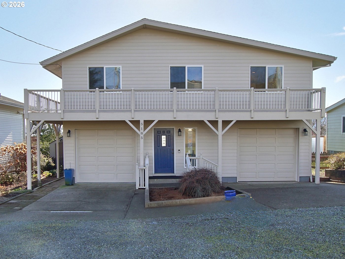 5185 Main Street Bay City, OR 97107 - Photo 1 of 48 a front view of a house with a garage