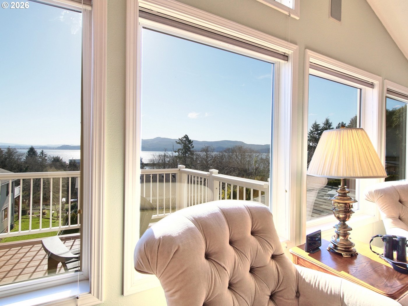 5185 Main Street Bay City, OR 97107 - Photo 19 of 48 a view of a living room filled with furniture and a window