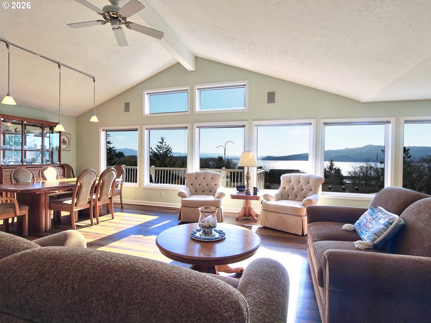 5185 Main Street Bay City, OR 97107 - Photo 2 of 48 a living room with fireplace furniture and a large window