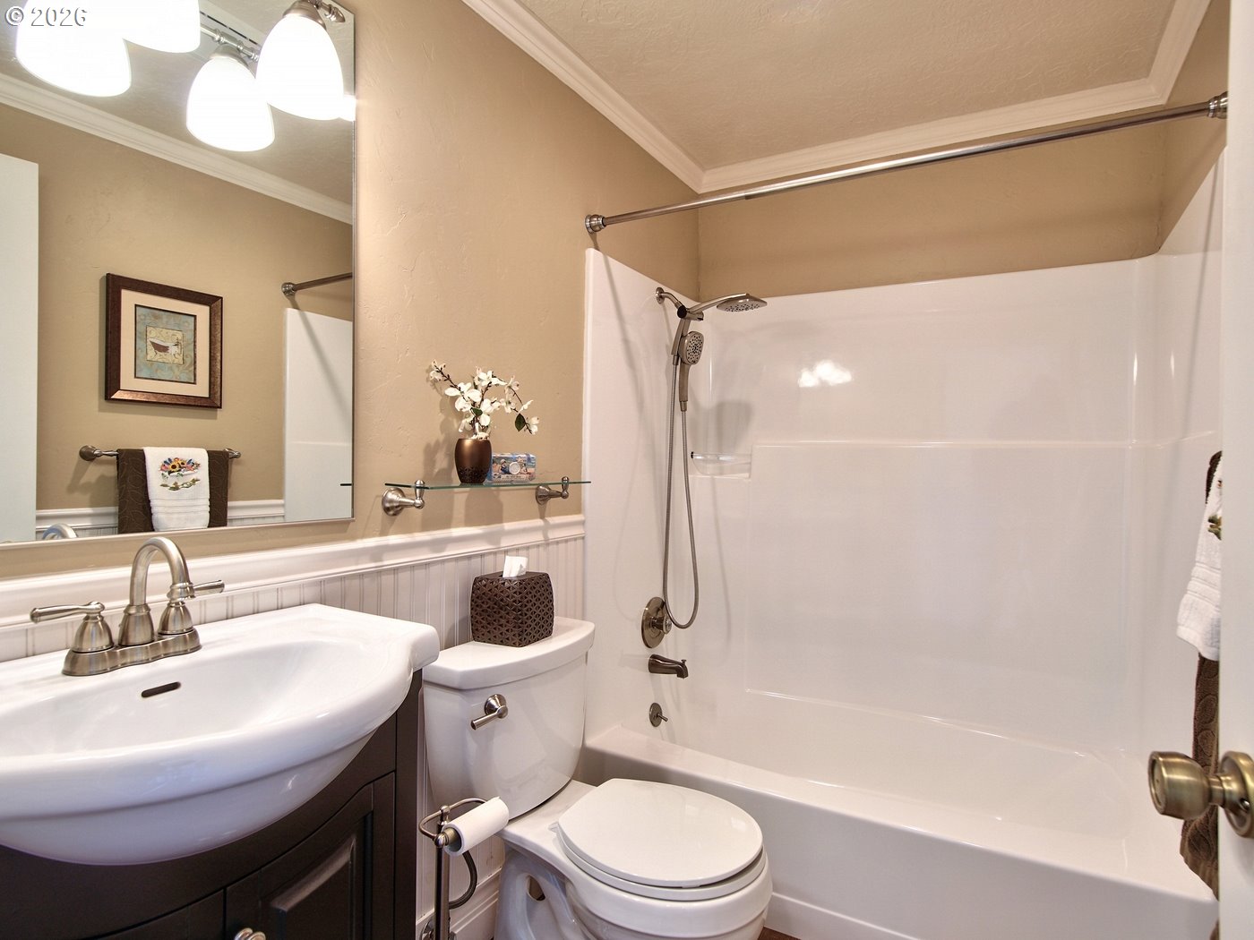 5185 Main Street Bay City, OR 97107 - Photo 28 of 48 a bathroom with a sink toilet a shower and a mirror