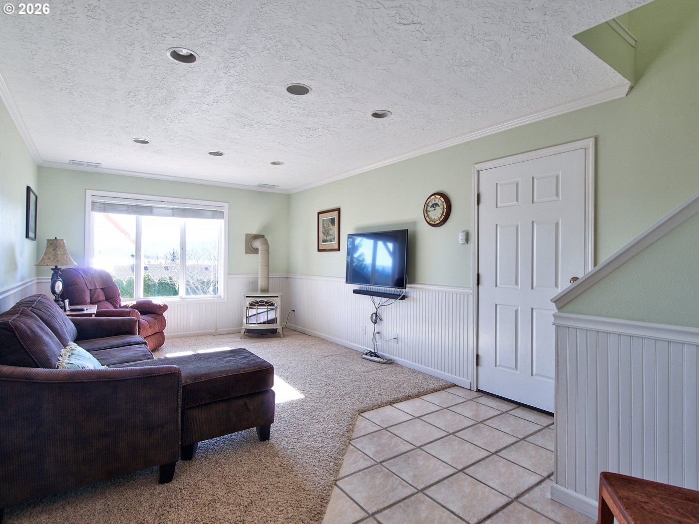 5185 Main Street Bay City, OR 97107 - Photo 30 of 48 a living room with furniture and a flat screen tv