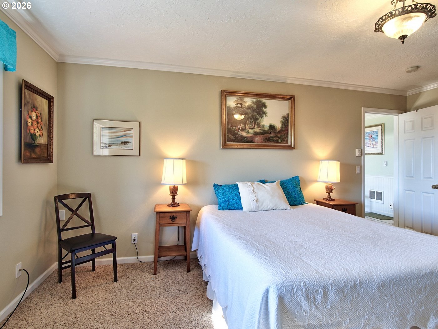 5185 Main Street Bay City, OR 97107 - Photo 34 of 48 a bedroom with a bed and a workspace