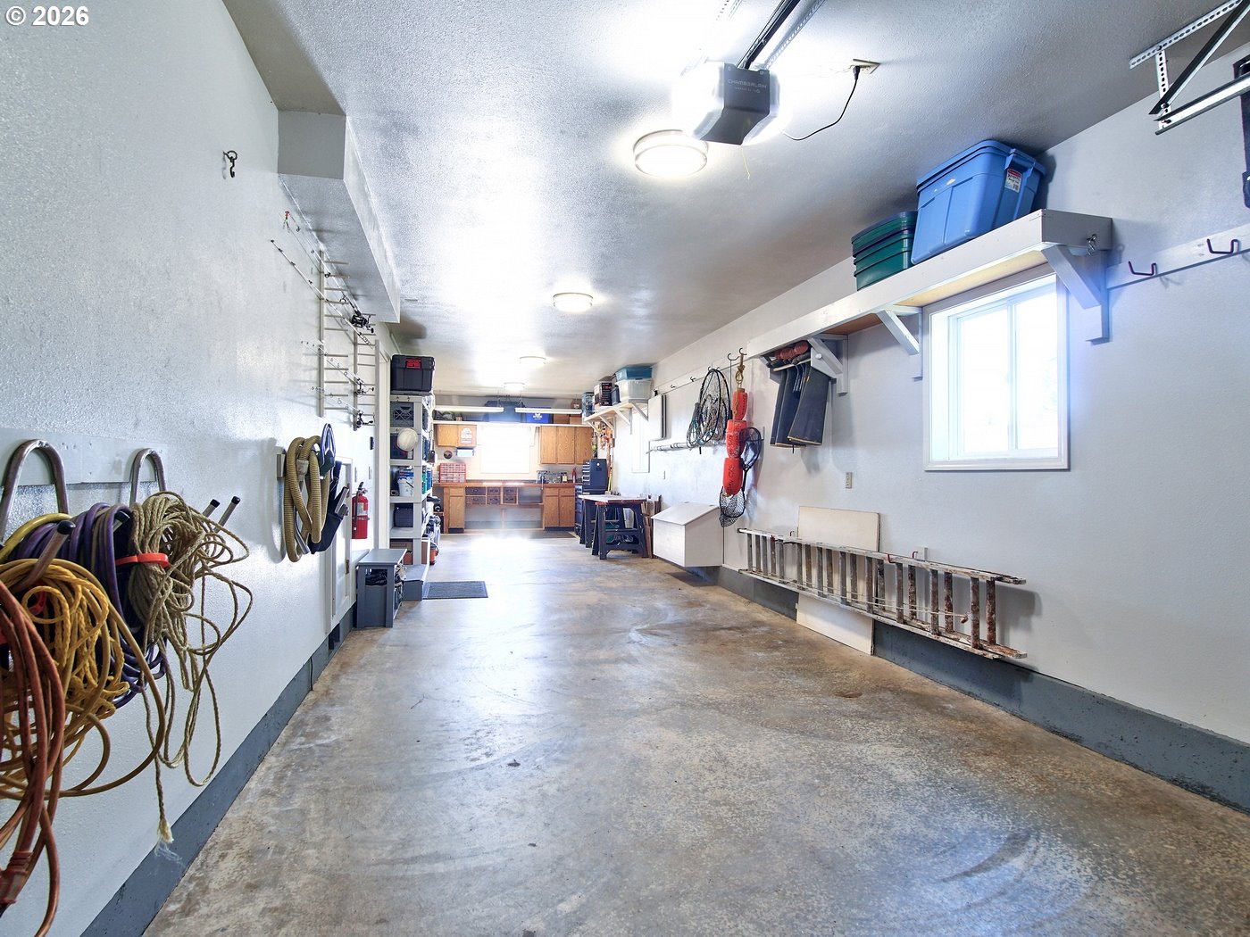 5185 Main Street Bay City, OR 97107 - Photo 40 of 48 a living room with furniture and a chandelier