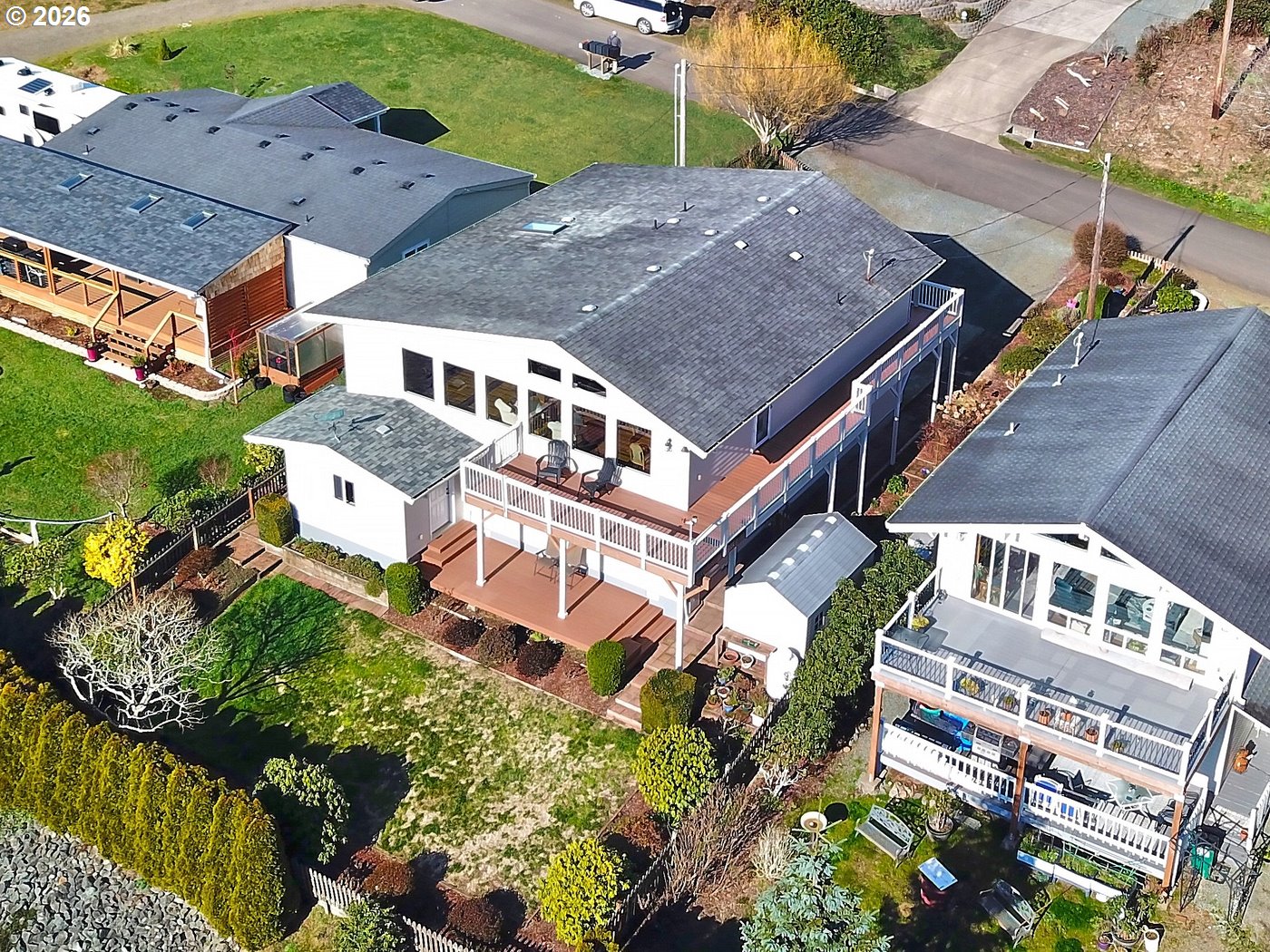 5185 Main Street Bay City, OR 97107 - Photo 45 of 48 an aerial view of multiple houses with a yard
