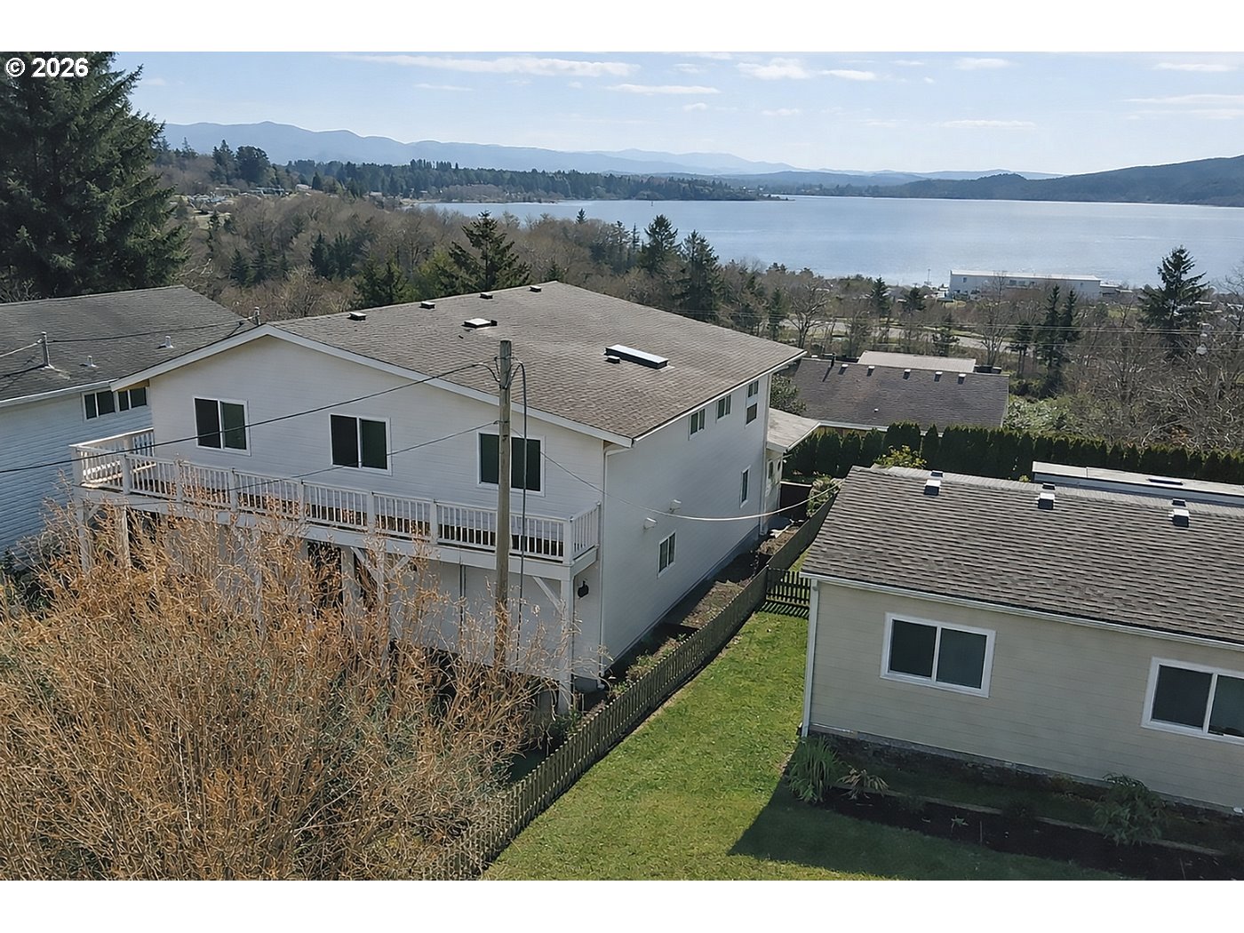 5185 Main Street Bay City, OR 97107 - Photo 5 of 48 a aerial view of a house with a yard