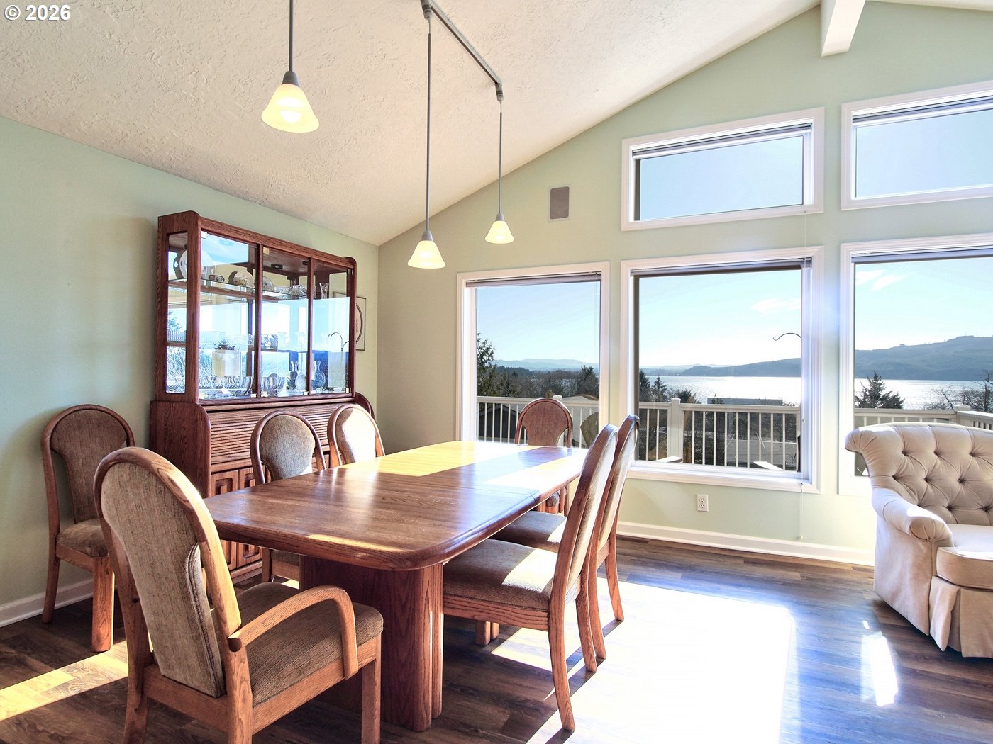 5185 Main Street Bay City, OR 97107 - Photo 10 of 48 a view of a dining room with furniture window and wooden floor