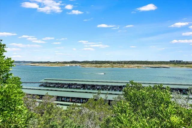 a view of a lake with a big yard