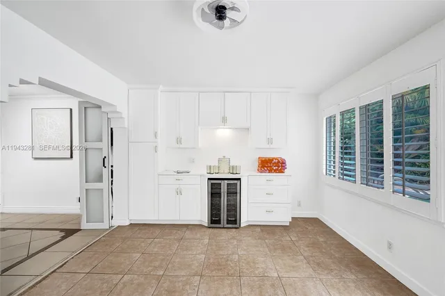 a bedroom with a bed and a view of bedroom