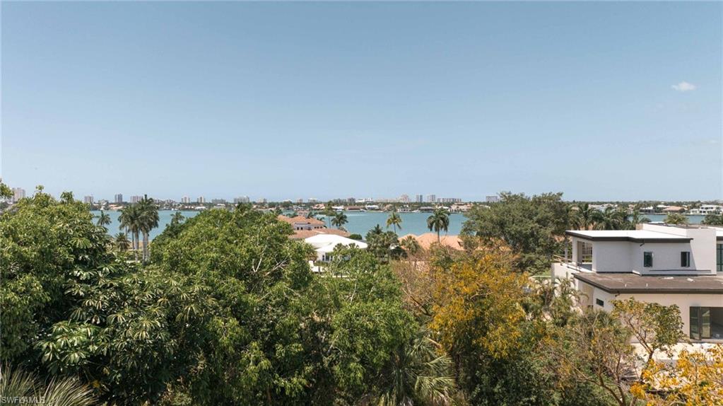 720 Inlet Drive Marco Island, FL 34145 - Photo 13 of 14 an aerial view of a house with a yard