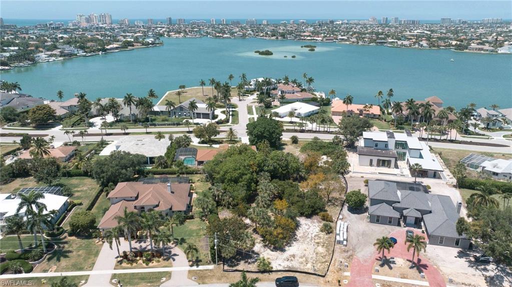 720 Inlet Drive Marco Island, FL 34145 - Photo 14 of 14 an aerial view of ocean and residential houses with outdoor space