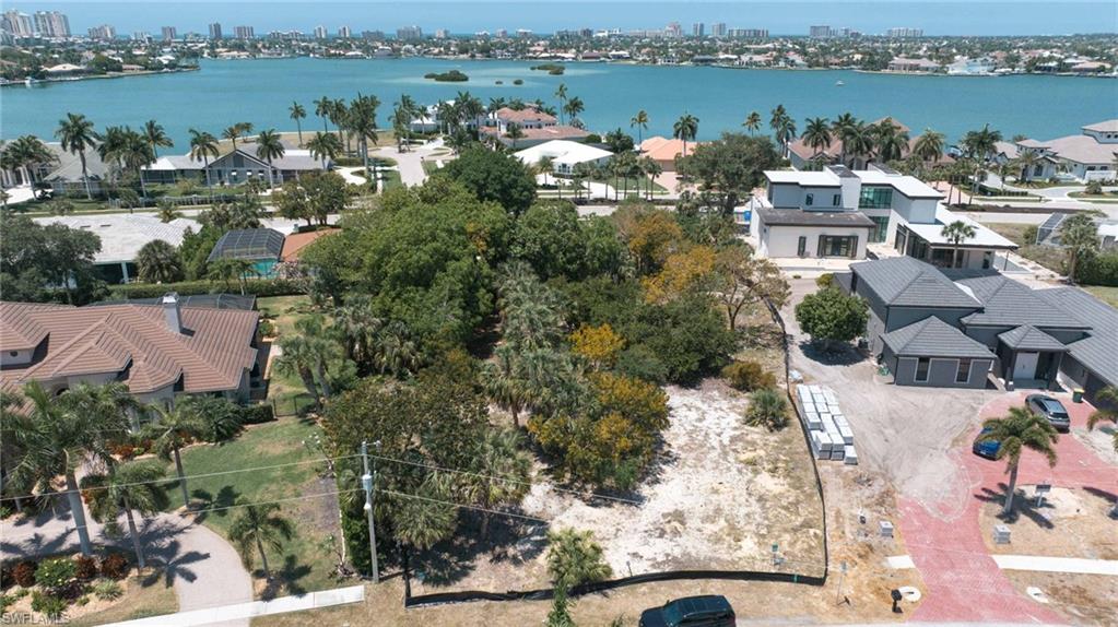 720 Inlet Drive Marco Island, FL 34145 - Photo 2 of 14 an aerial view of a city with lake view