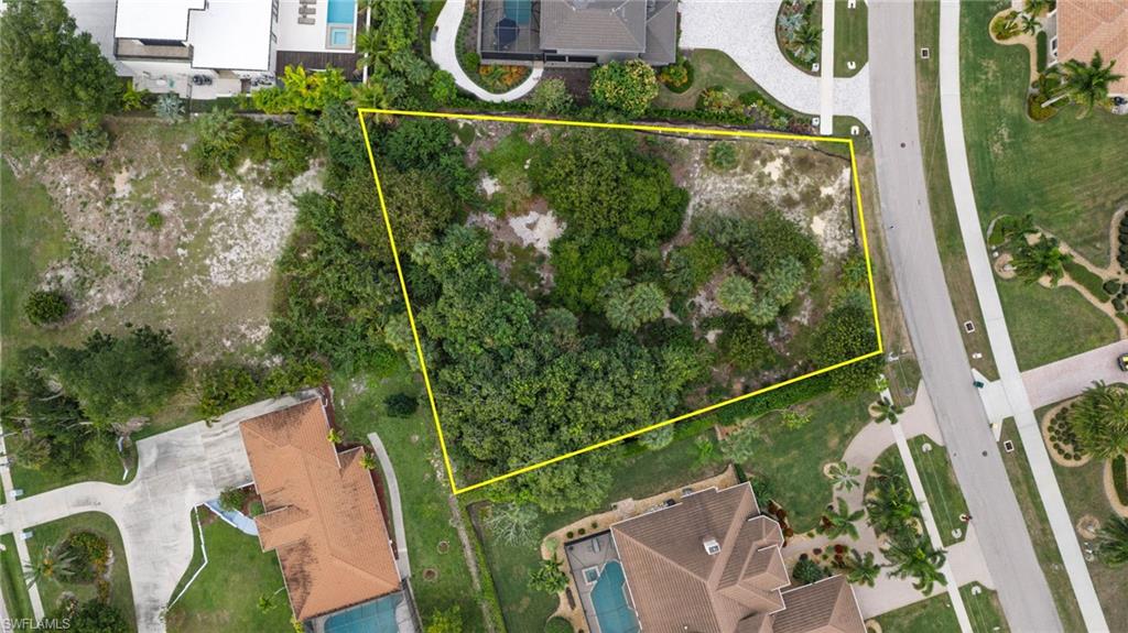 720 Inlet Drive Marco Island, FL 34145 - Photo 4 of 14 an aerial view of a residential houses with yard