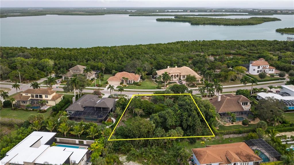 720 Inlet Drive Marco Island, FL 34145 - Photo 8 of 14 an aerial view of house with yard swimming pool and outdoor seating