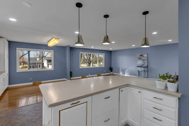 a view of an empty room with a fireplace