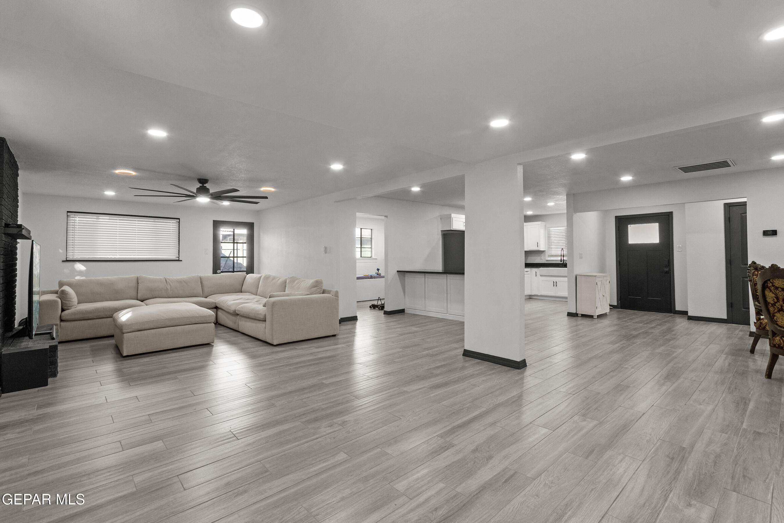 3425 Rutherglen Street El Paso, TX 79925 - Photo 12 of 34 a living room with furniture and wooden floor
