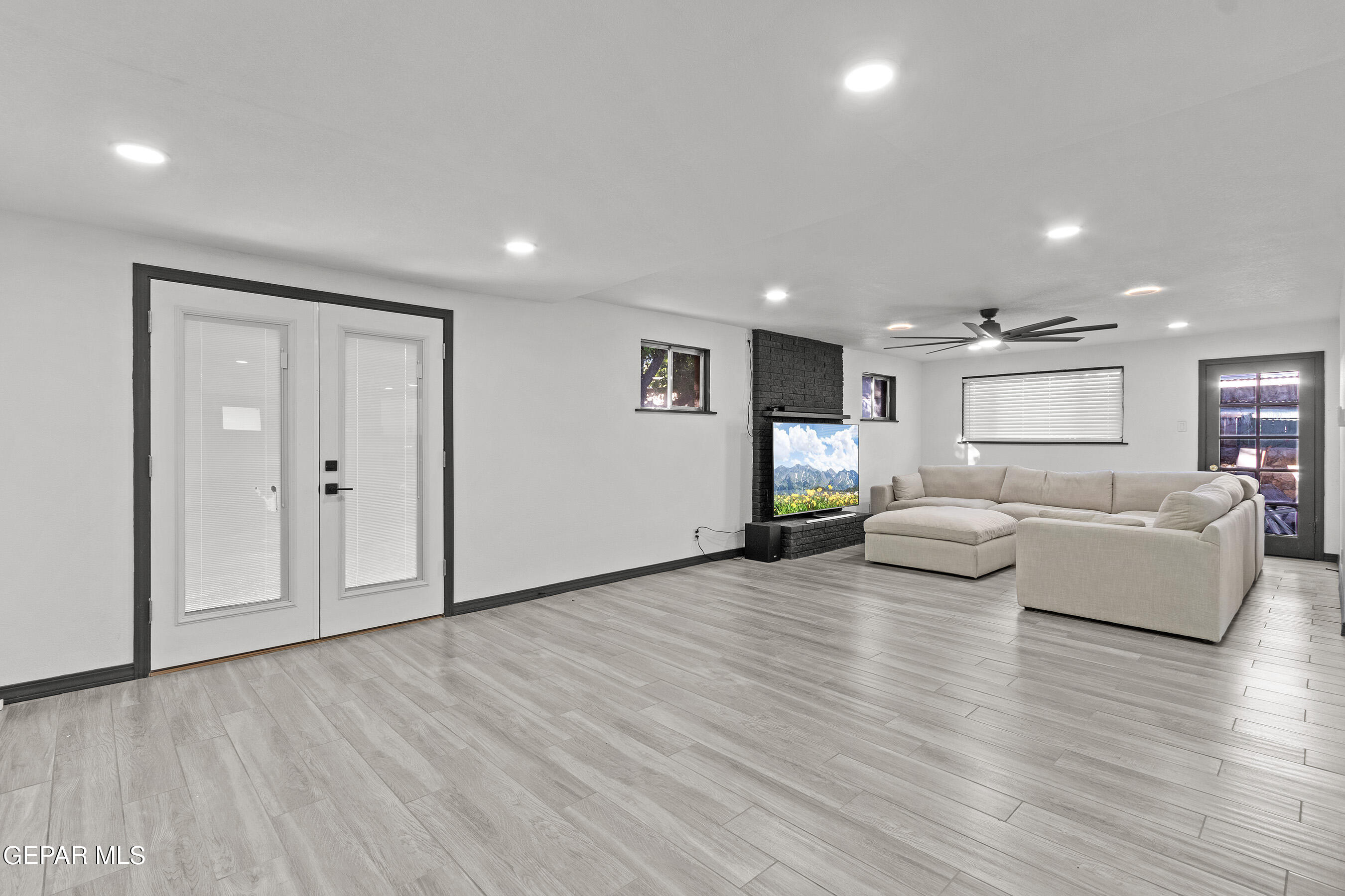 3425 Rutherglen Street El Paso, TX 79925 - Photo 14 of 34 a living room with furniture and wooden floor