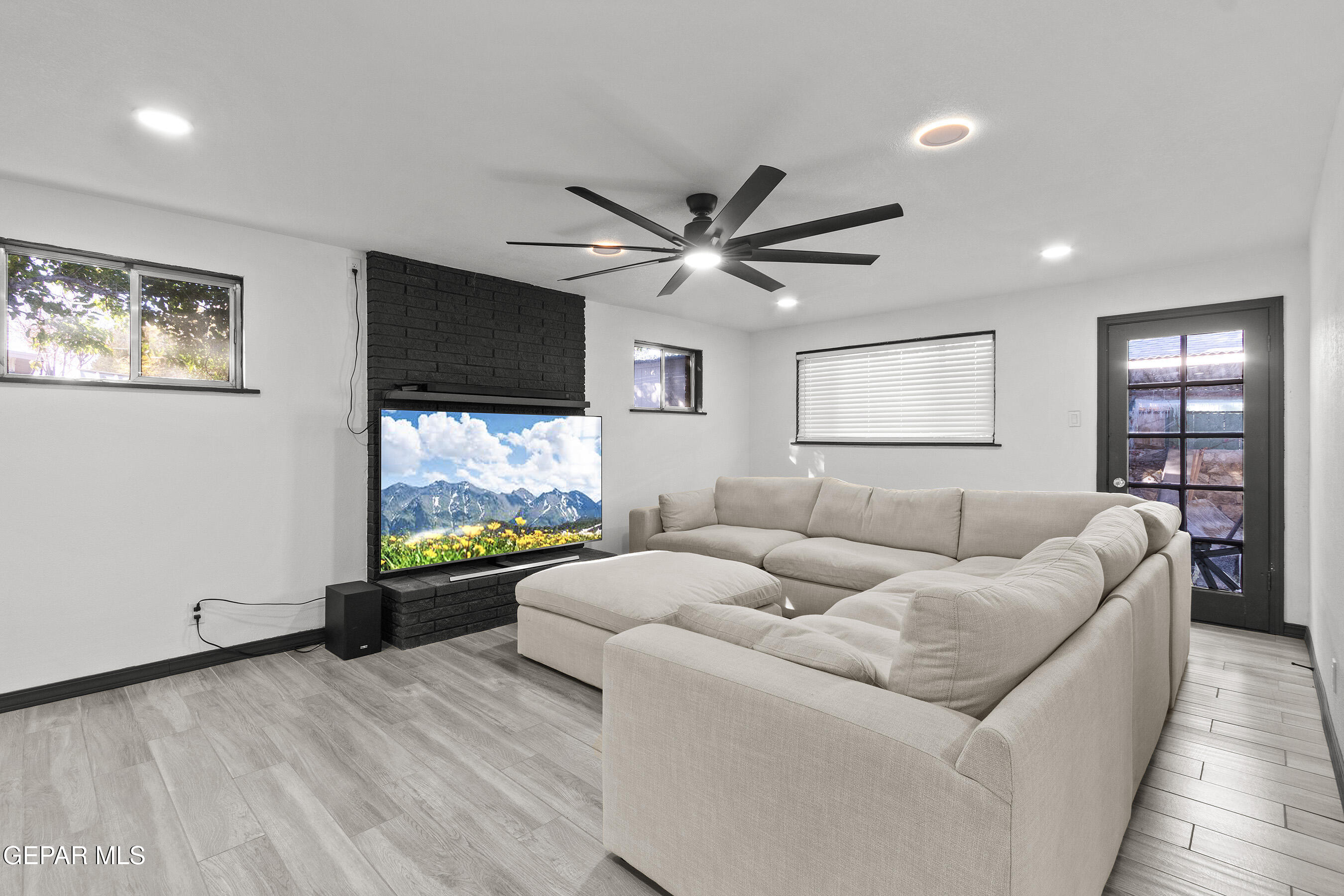 3425 Rutherglen Street El Paso, TX 79925 - Photo 17 of 34 a living room with furniture and a flat screen tv