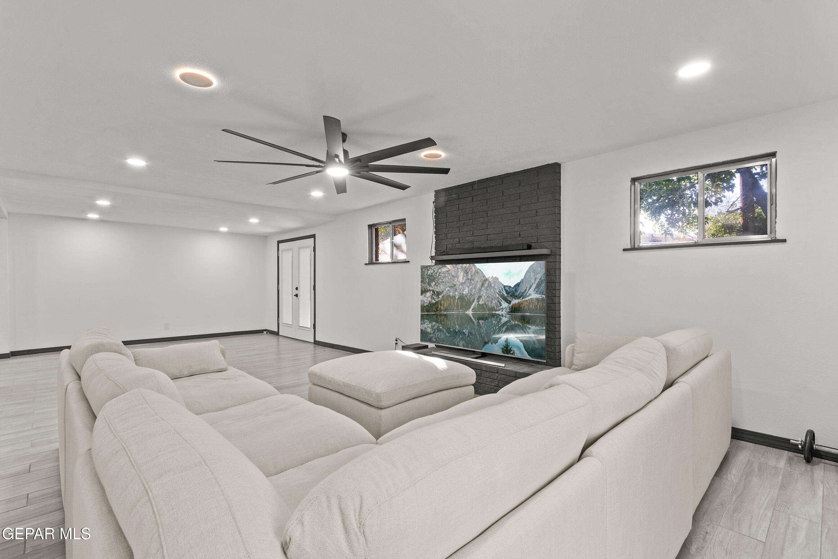 3425 Rutherglen Street El Paso, TX 79925 - Photo 19 of 34 a living room with furniture and a large window