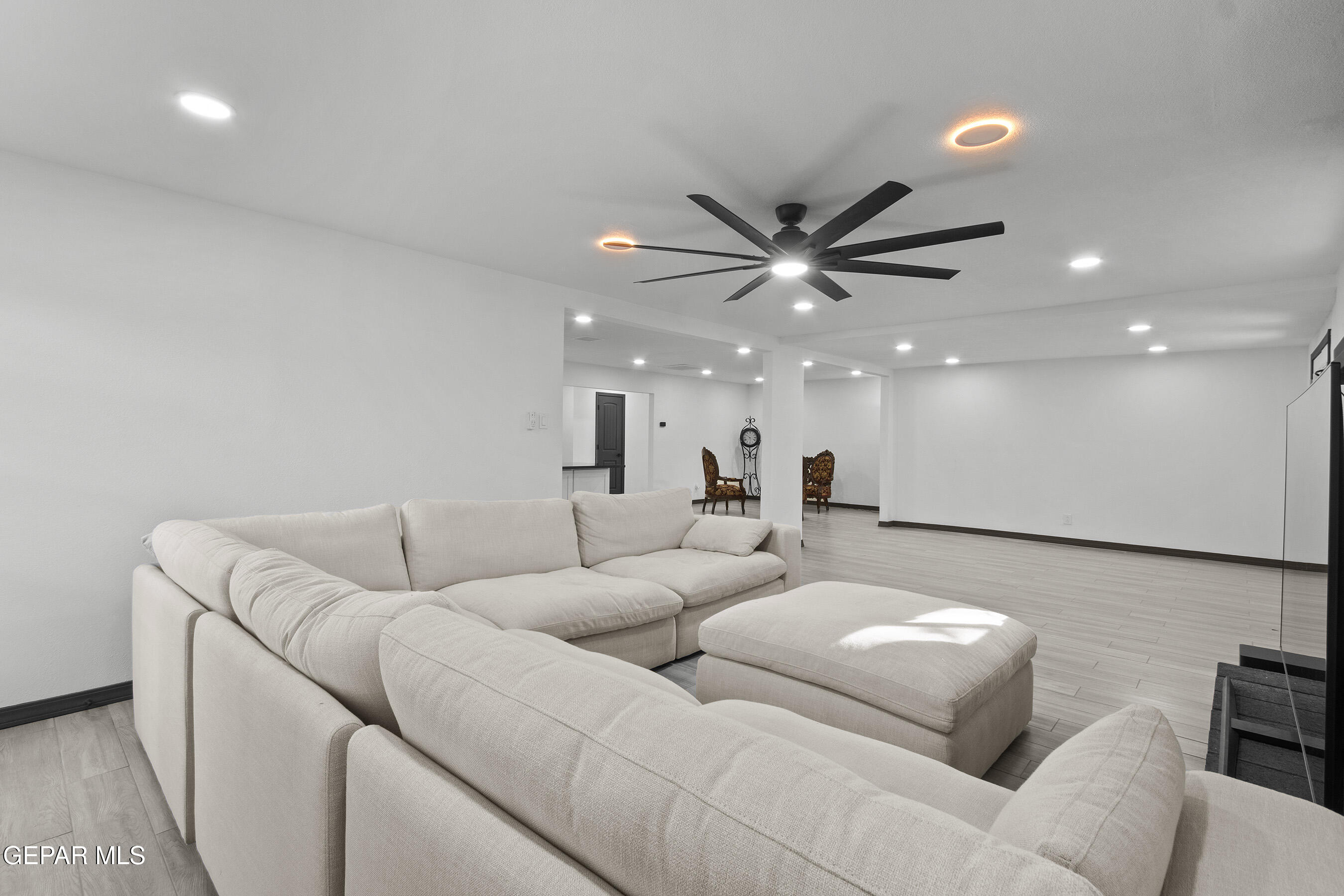 3425 Rutherglen Street El Paso, TX 79925 - Photo 20 of 34 a living room with furniture and a ceiling fan