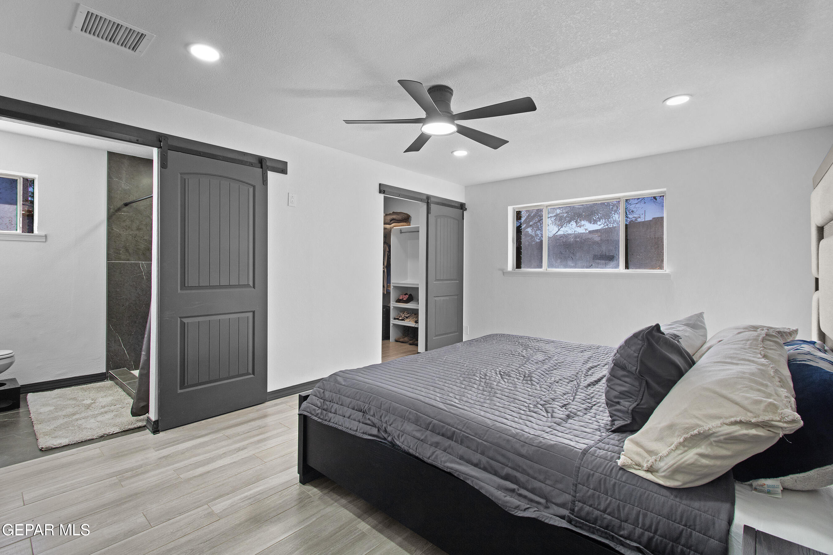 3425 Rutherglen Street El Paso, TX 79925 - Photo 27 of 34 a bedroom with a bed and a window