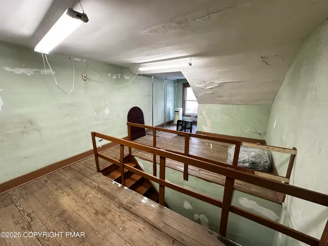 a kitchen with a sink appliances and cabinets