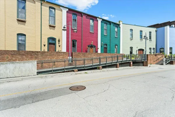 a view of a building with furniture