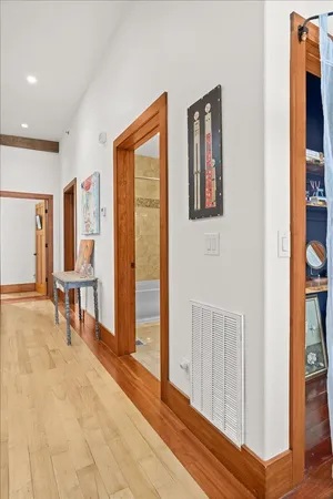 a view of a bathroom with a sink and a mirror
