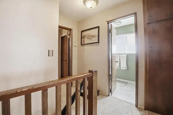 a bathroom with a sink vanity and mirror
