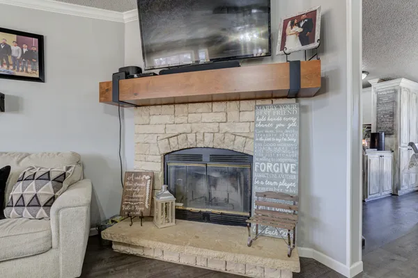 a kitchen with stainless steel appliances granite countertop a sink and a stove