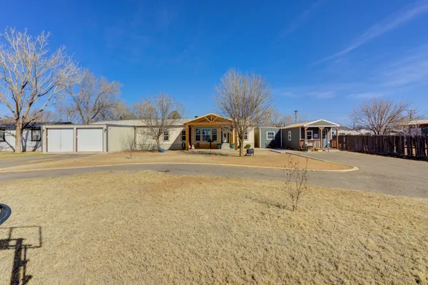 a house with trees in front of it