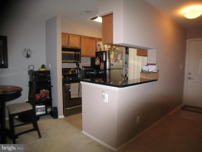 11659 Chesterfield Court, Unit 11659 Reston, VA 20190 - Photo 7 of 16 Kitchen/Dining Room