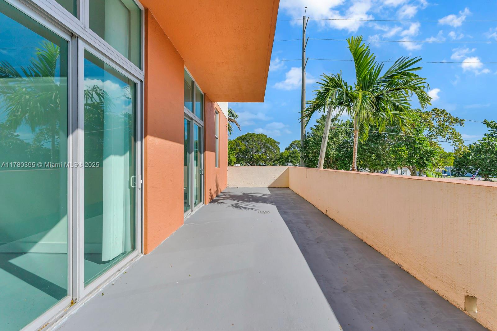 2100 Van Buren Street, Unit 206 Hollywood, FL 33020 - Photo 13 of 17 a view of balcony with furniture