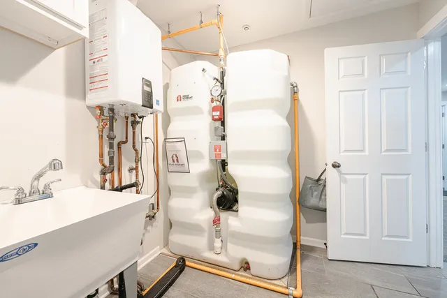 a bathroom with a sink and mirror