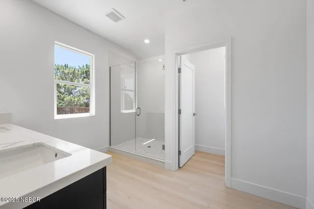 a view of an empty walk in closet