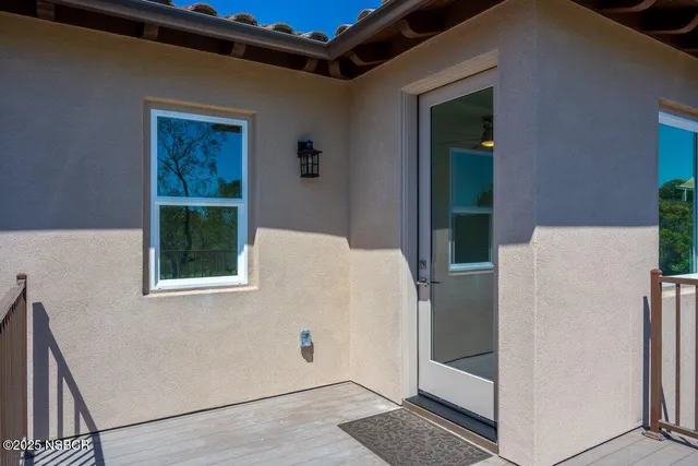 a view of a balcony with a garden