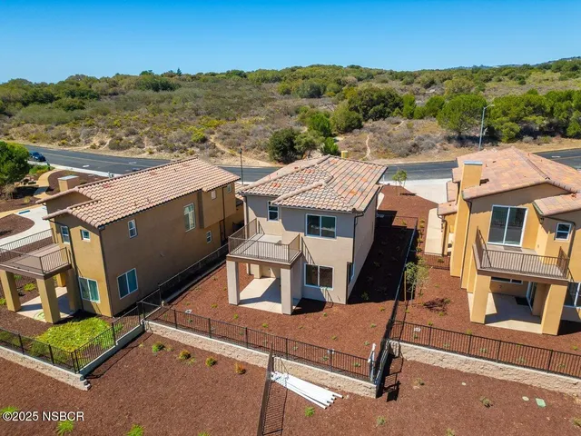 a view of backyard with green space