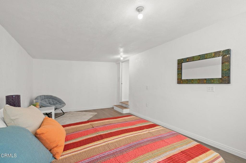 4025 Maxson Road El Monte, CA 91732 - Photo 16 of 27 a bedroom with a bed and lamp