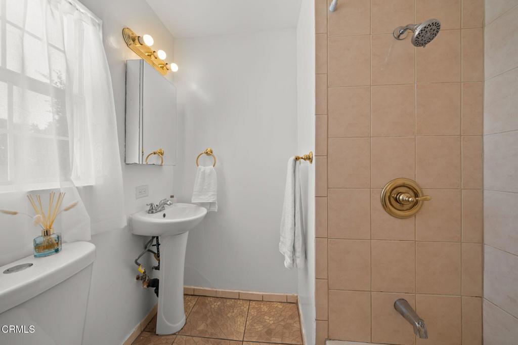 4025 Maxson Road El Monte, CA 91732 - Photo 17 of 27 a bathroom with a sink toilet and shower