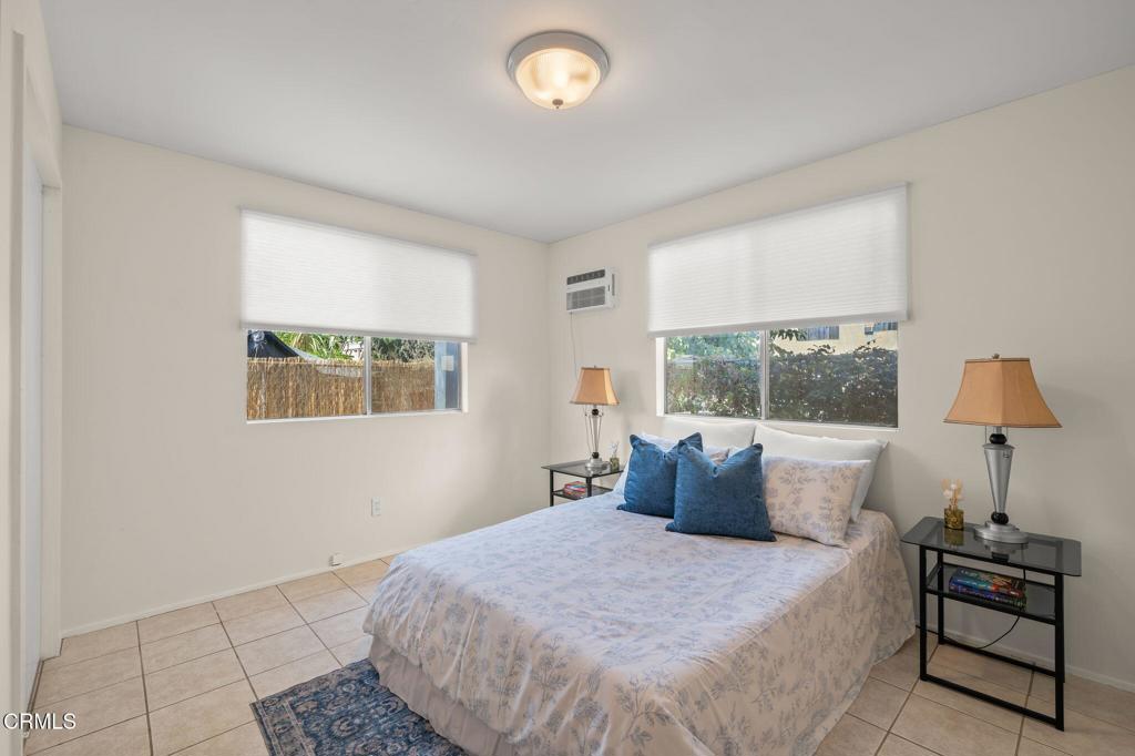 4025 Maxson Road El Monte, CA 91732 - Photo 19 of 27 a bedroom with a bed and a window