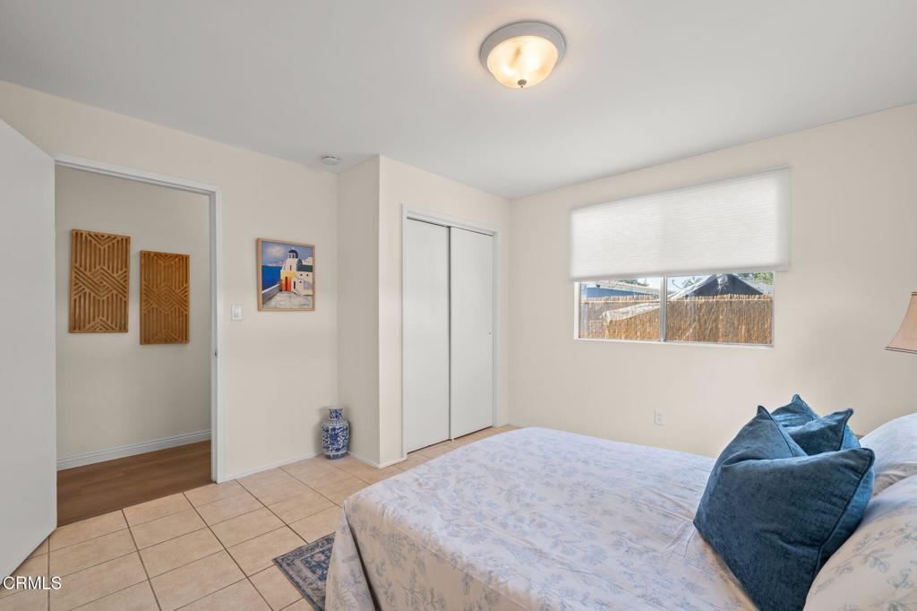 4025 Maxson Road El Monte, CA 91732 - Photo 21 of 27 a bedroom with a bed and a window