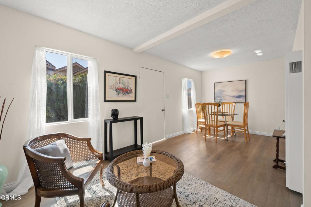 4025 Maxson Road El Monte, CA 91732 - Photo 6 of 27 a work room with furniture and wooden floor
